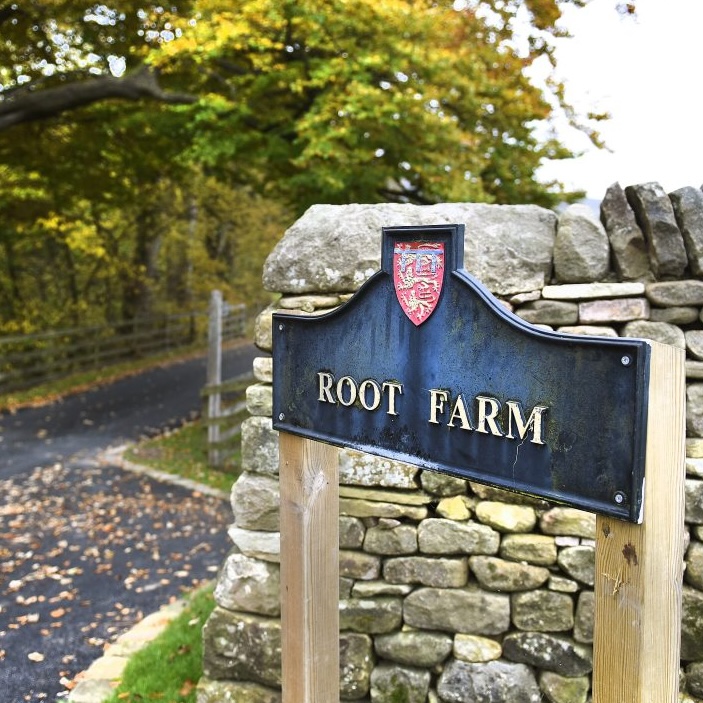 The entrance sign to Root Farm, home of Flourish Florist's workshop
